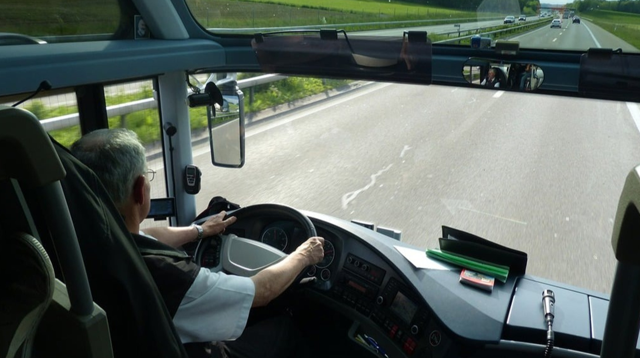 someone driving a bus